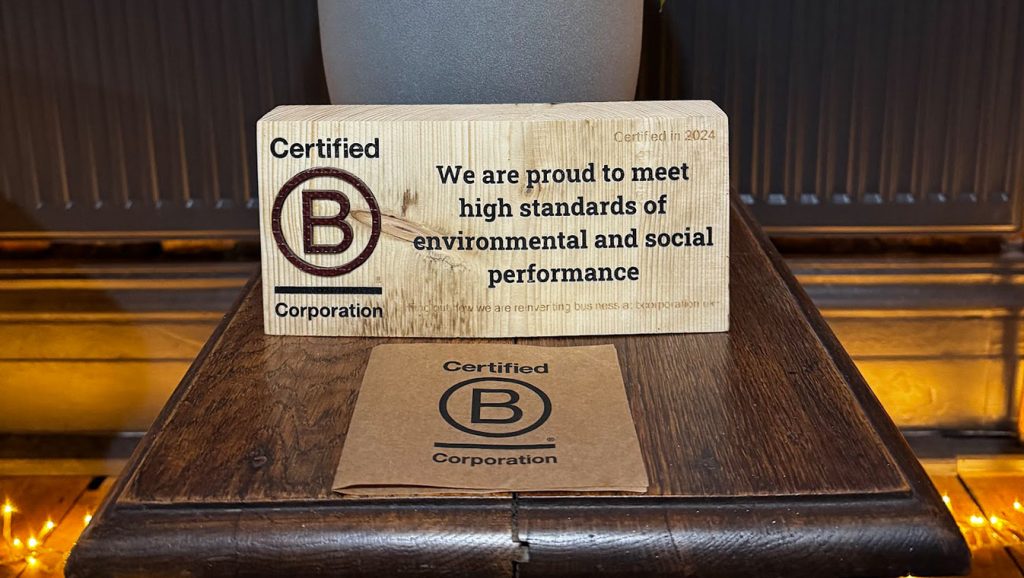 Our B Corp Plaque in the Sunderland office - Phonetic Digital